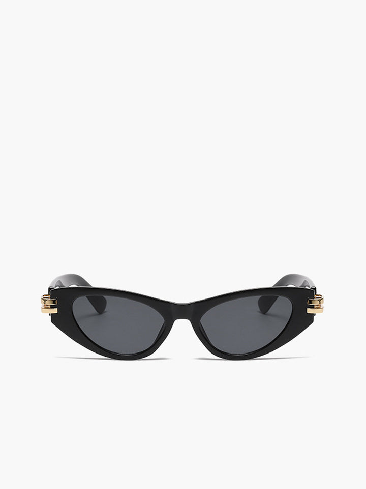 Black women's cat eye retro sunglasses. Elegant vintage style eyewear, a must-have accessory.
