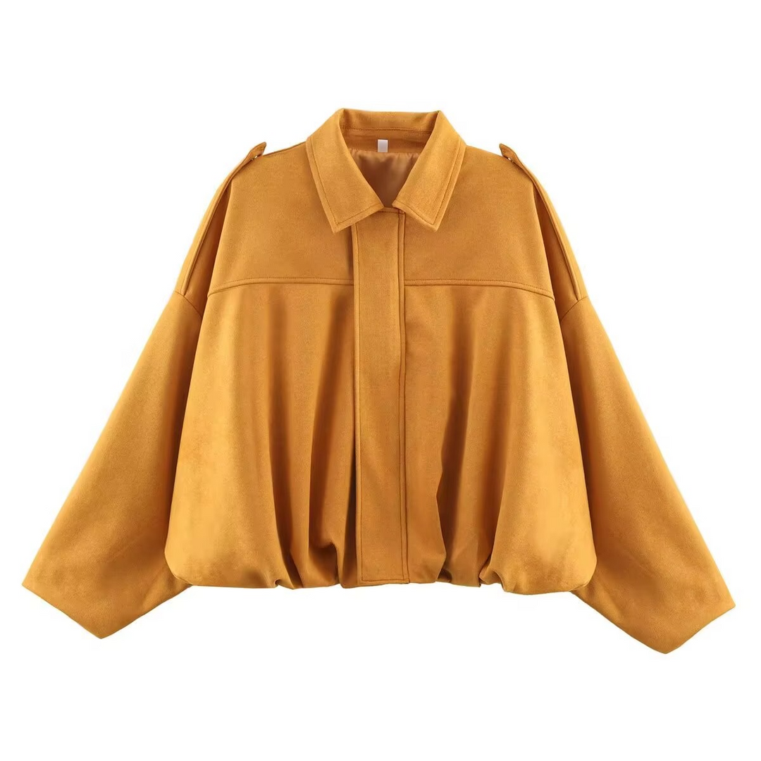 Women's vintage bomber jacket, oversized fit, key piece of women's casual fashion outerwear for layering.