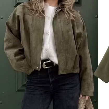 Front view: Women's vintage oversized bomber jacket, showcasing its relaxed fit for fashion & layering.