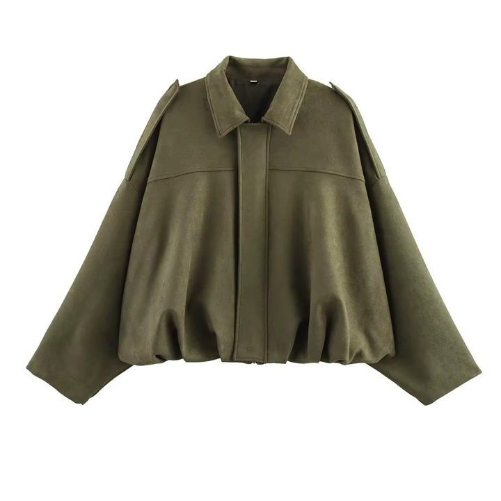 Close-up: Fabric detail of women's vintage oversized bomber jacket, durable outerwear for women's fashion.