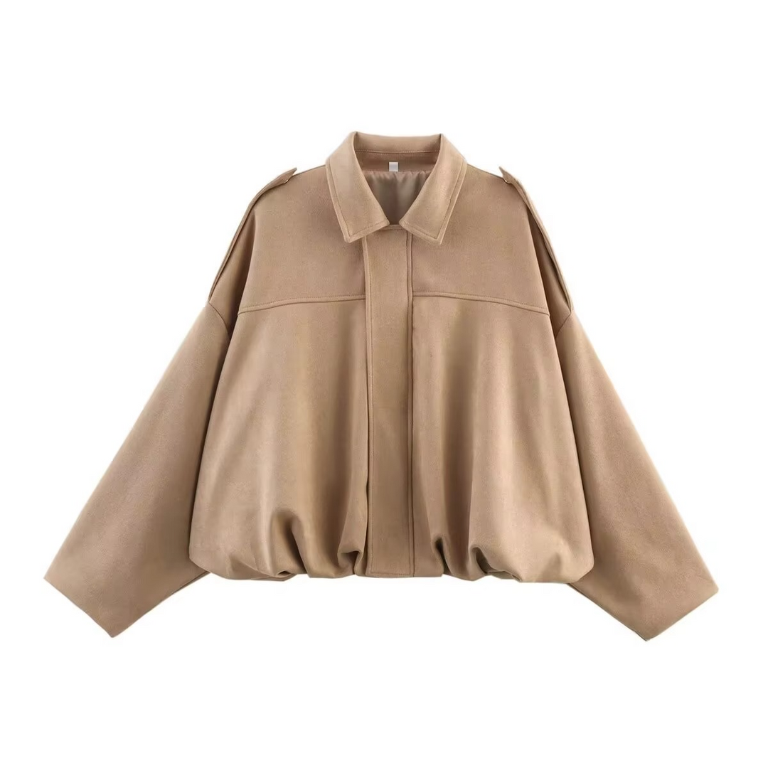 Women's oversized bomber jacket in a neutral tone, versatile vintage outerwear for everyday layering.