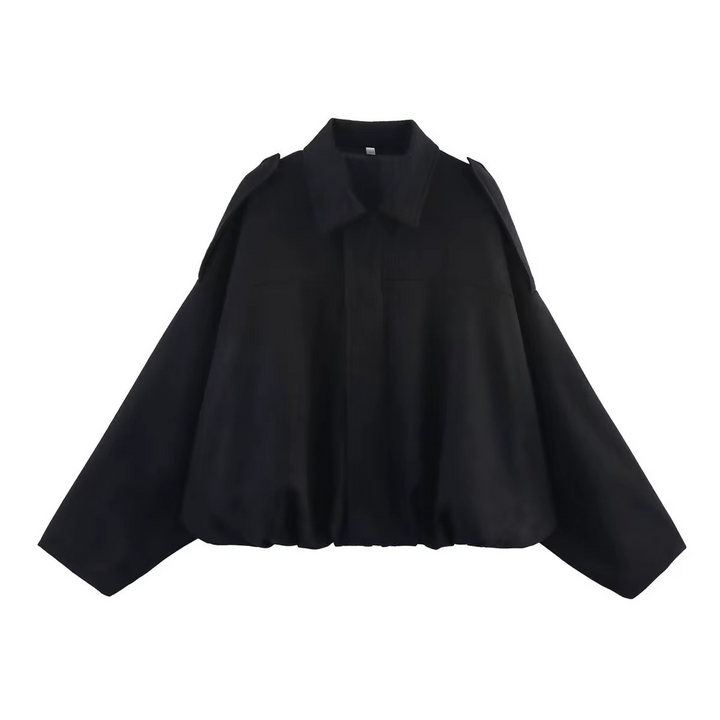 Side profile: Women's vintage oversized bomber jacket, showing comfy, relaxed silhouette, casual wear.