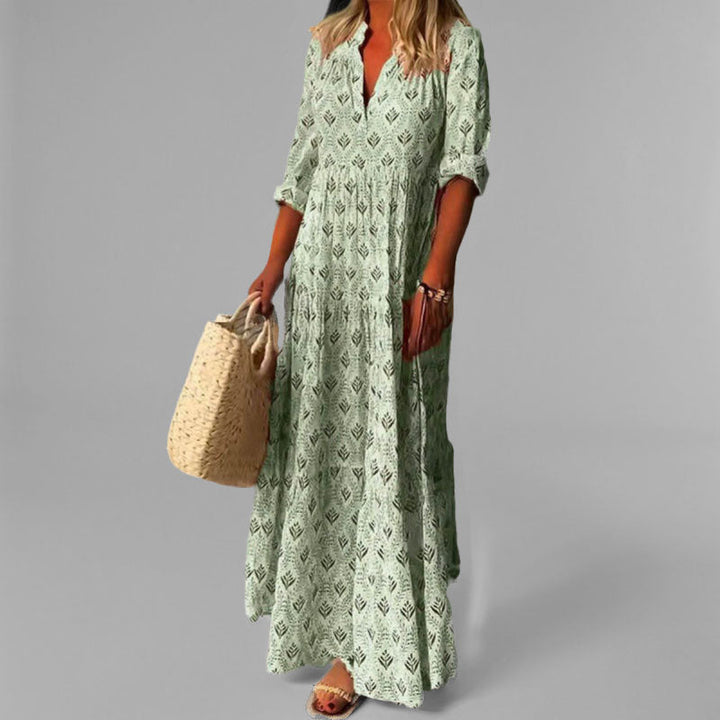 Flowy women's long cotton maxi dress, comfortable and stylish with a vintage print and V-neck.