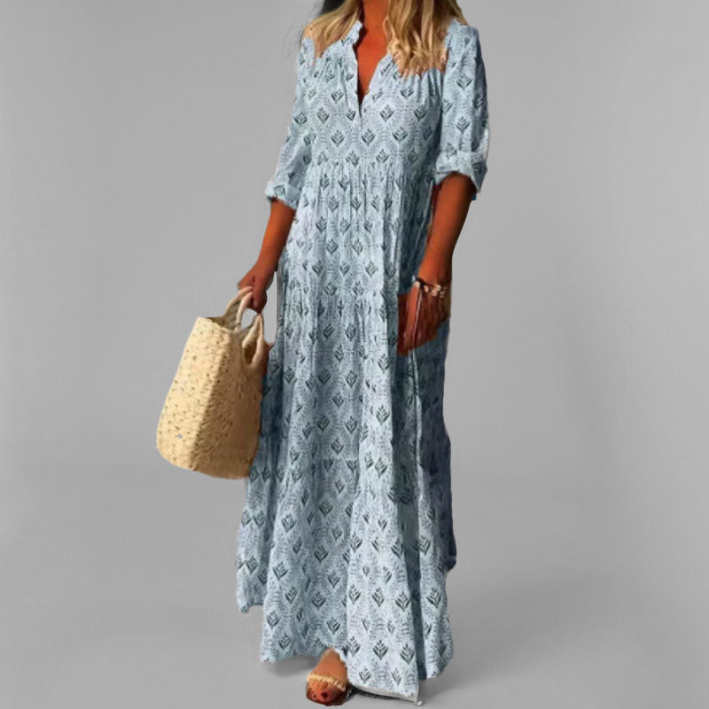 Casual women's cotton maxi dress with V-neck, long and flowy. Features a beautiful vintage print.