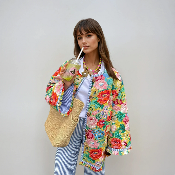 Women's vintage quilted floral jacket. Oversized, patchwork design. Perfect fall/winter statement outerwear.
