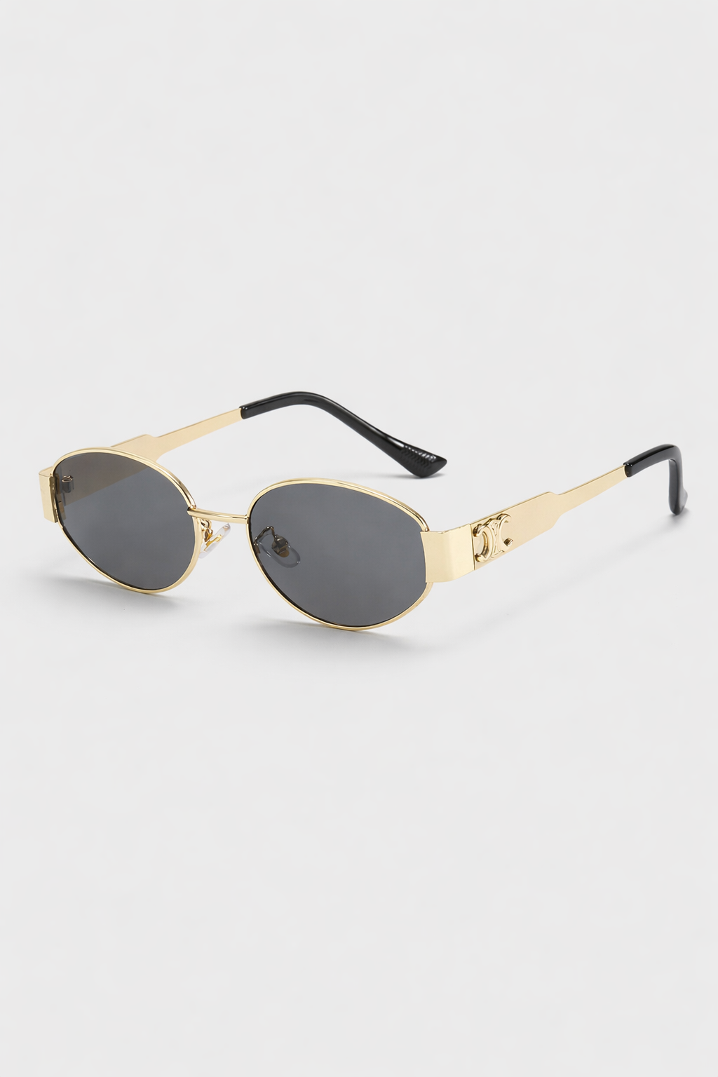 Elegant women's vintage round metal sunglasses. Fashionable retro eyewear with UV400 lenses, a chic accessory.