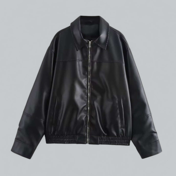Women's vintage style faux leather jacket. Chic outerwear for fall fashion.