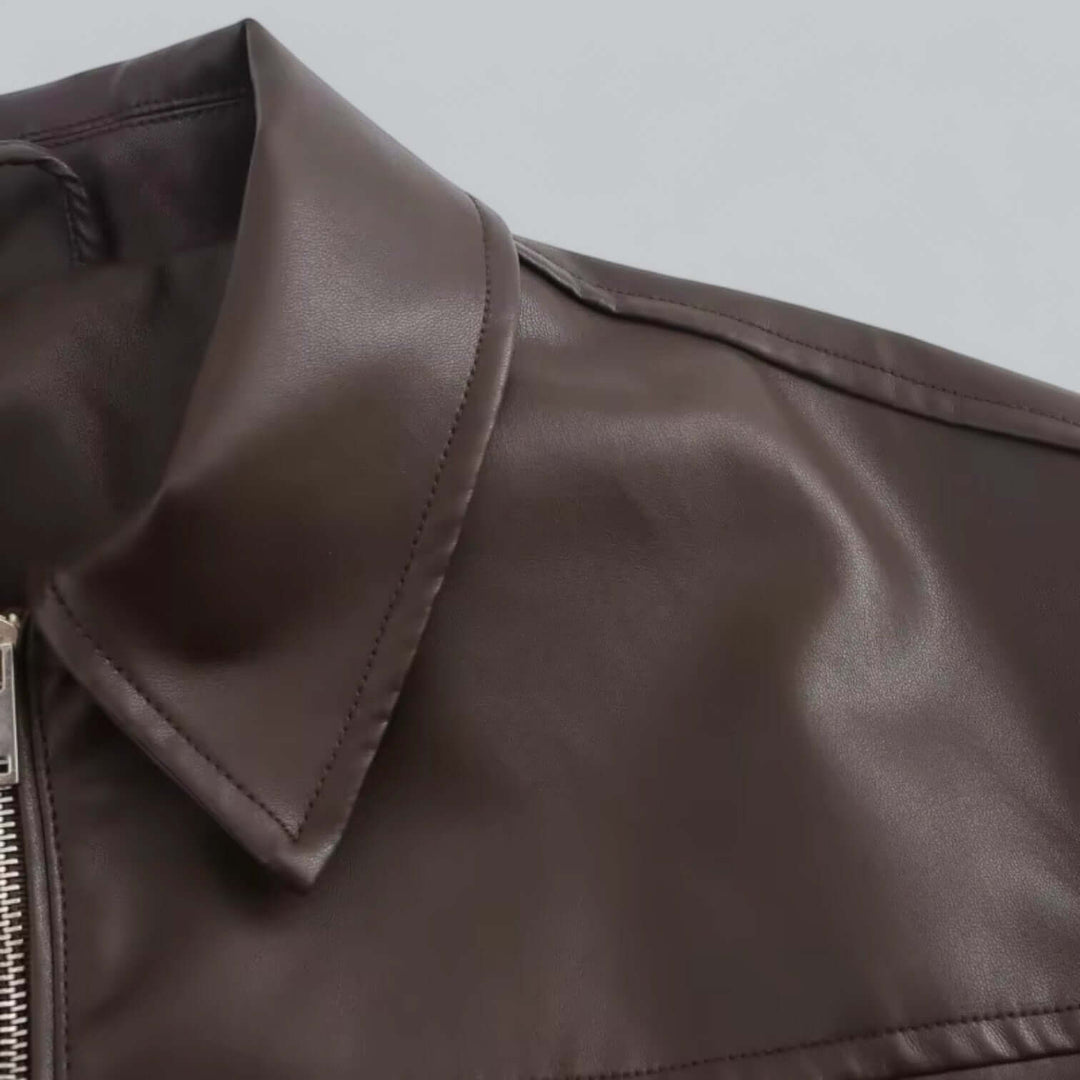 Chic oversized faux leather jacket for women. Vintage style outerwear, perfect for fall fashion.