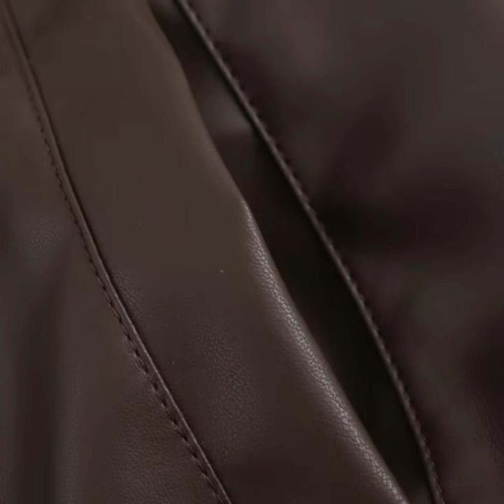 Versatile women's vintage style faux leather jacket. Great for fall & winter layering.