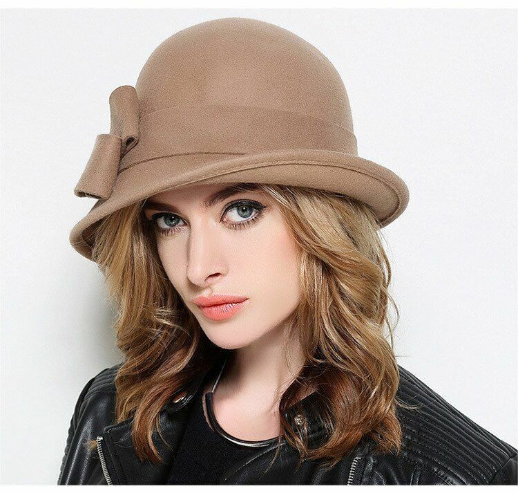 Elegant women's fedora wool hat, a stylish vintage accessory for fall and winter fashion outfits.