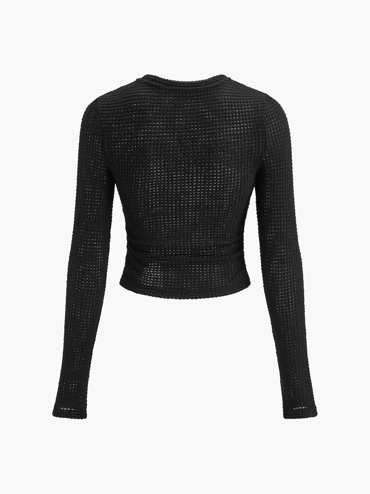 Waffle knit long sleeve women's top, slim fit, crew neck. A comfortable and versatile textured shirt.