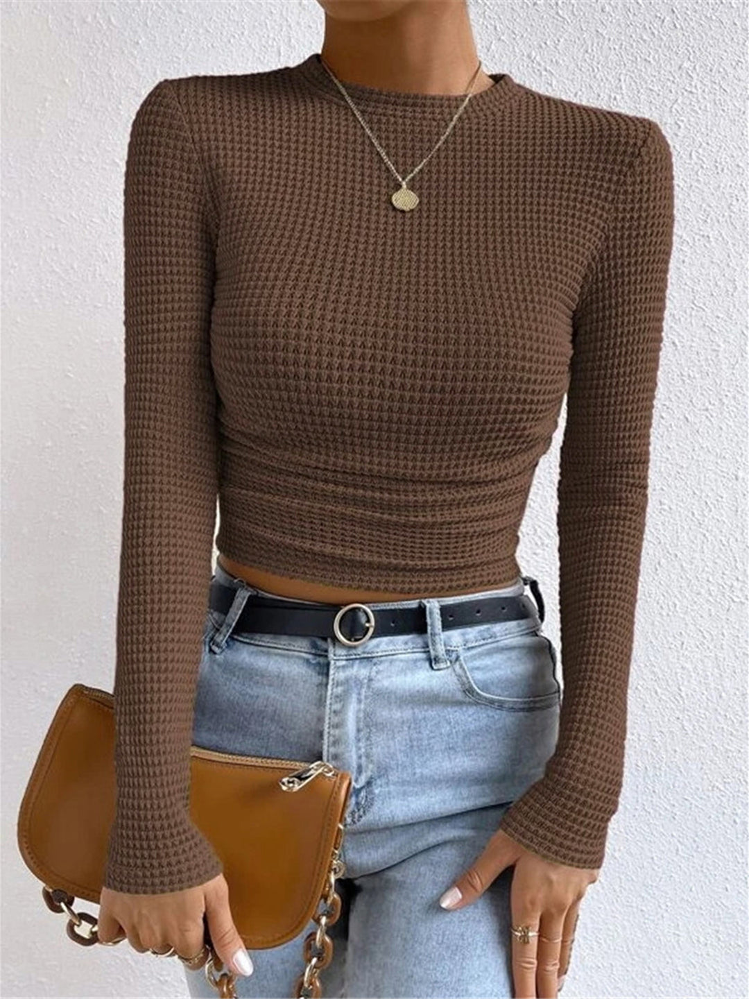 Women's long sleeve waffle knit crew neck top, slim fit. Versatile everyday layering shirt.