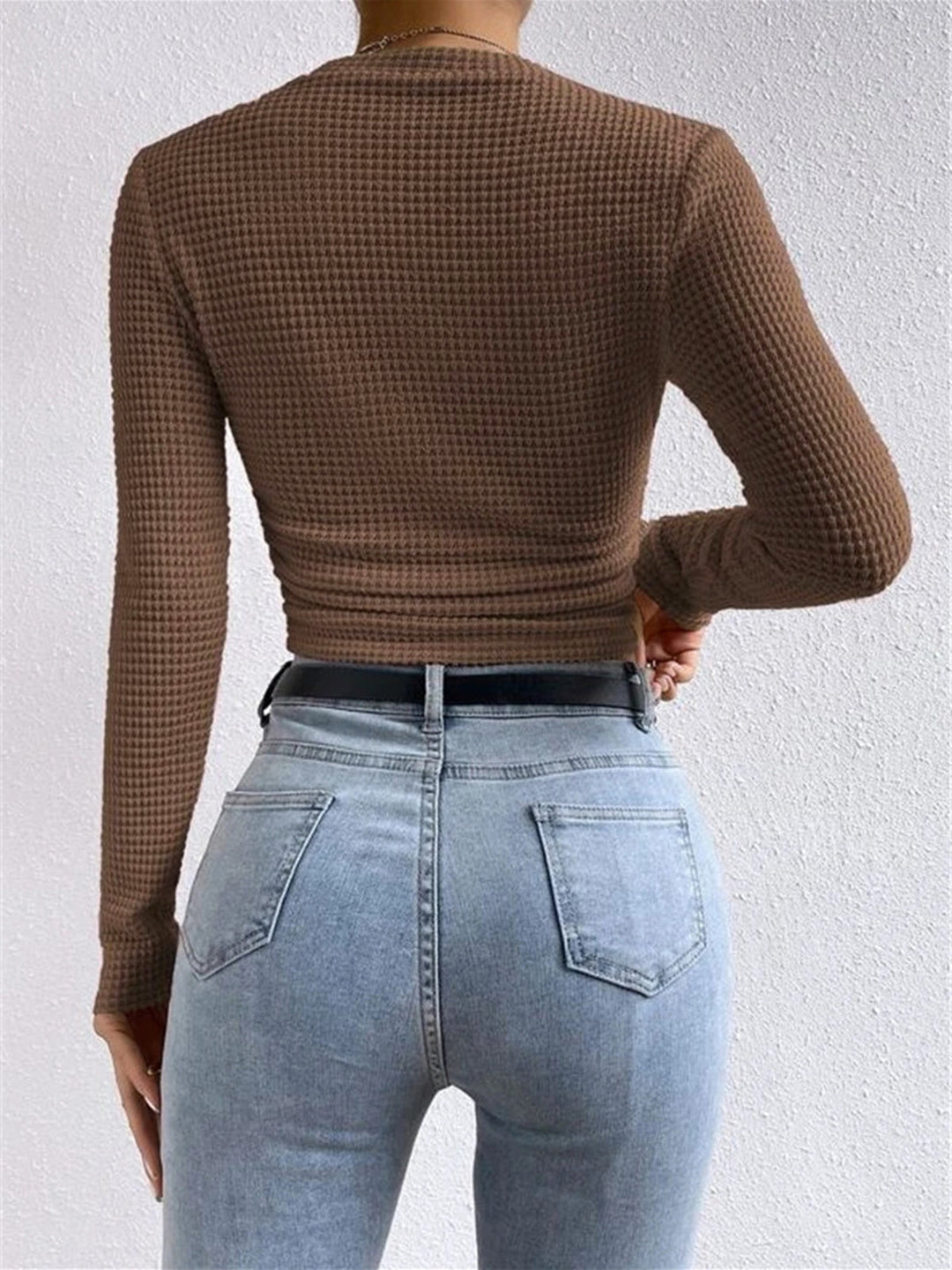 Women's long sleeve waffle knit crew neck. Slim fit design, versatile for everyday or layering outfits.