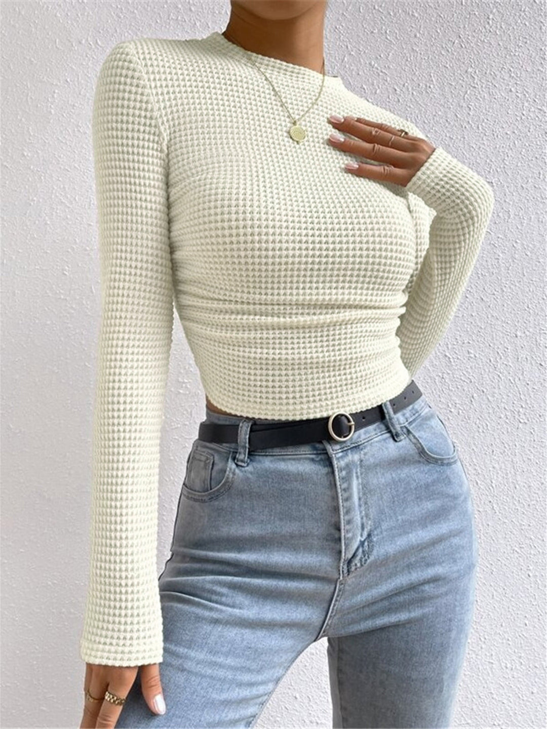Textured waffle knit long sleeve top for women, crew neck, slim fit. Ideal as a layering top.