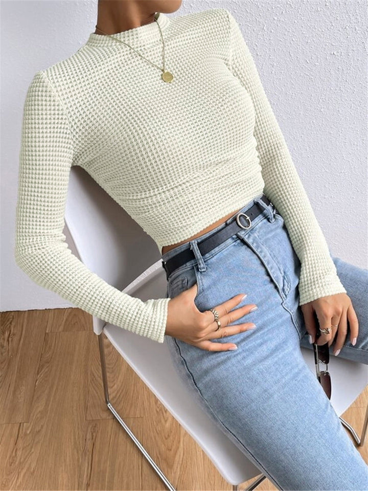 Versatile women's long sleeve waffle knit top, slim fit, crew neck. Perfect for everyday styling.