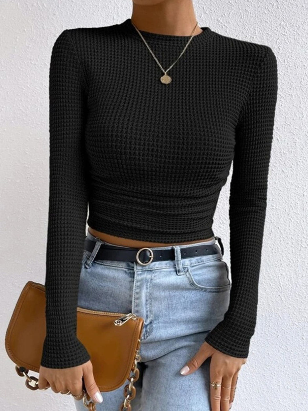 Everyday women's long sleeve crew neck top, slim fit. Textured waffle knit ensures comfort.