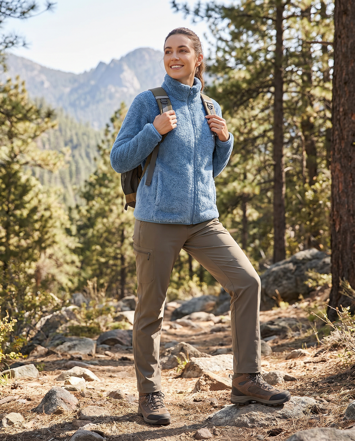 Stylish women's zip-up fleece jacket for cold weather, a comfortable and warm outerwear choice.