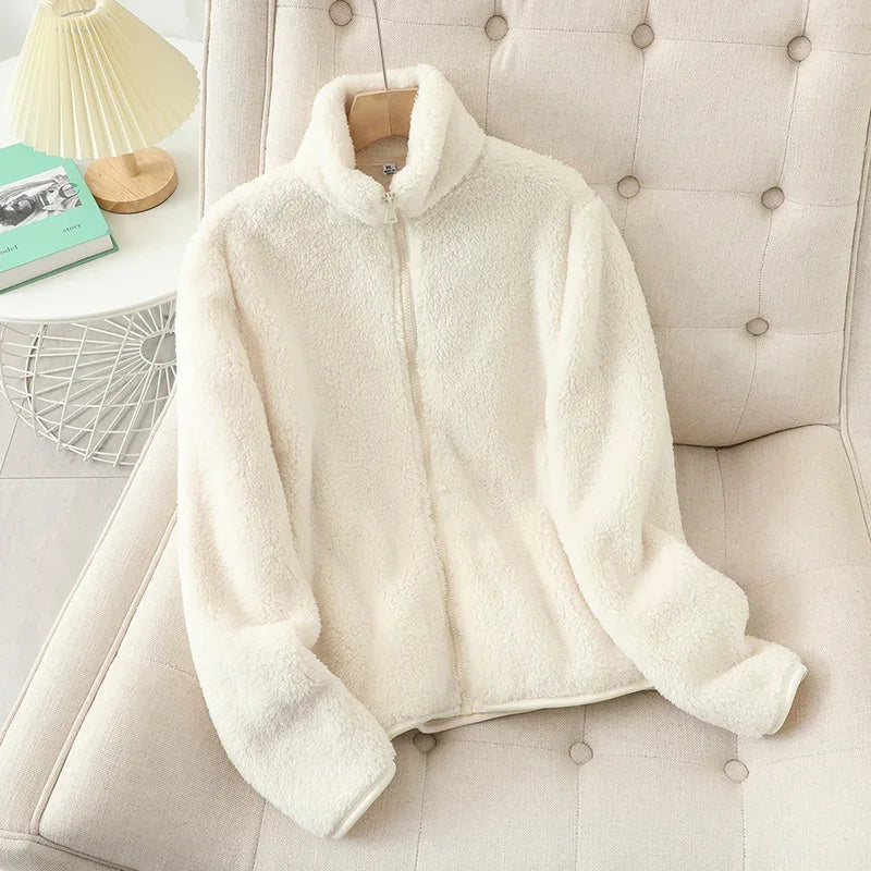 Fashionable women's warm fleece outerwear, a comfortable and stylish zip jacket for winter.