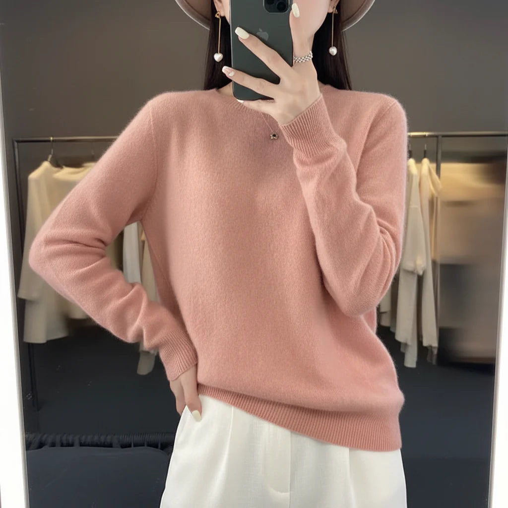Chic women's long sleeve crewneck sweater, perfect for casual layering and warmth.