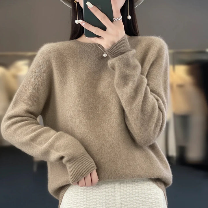 Cozy women's pullover sweater with a classic crewneck design for ultimate comfort.