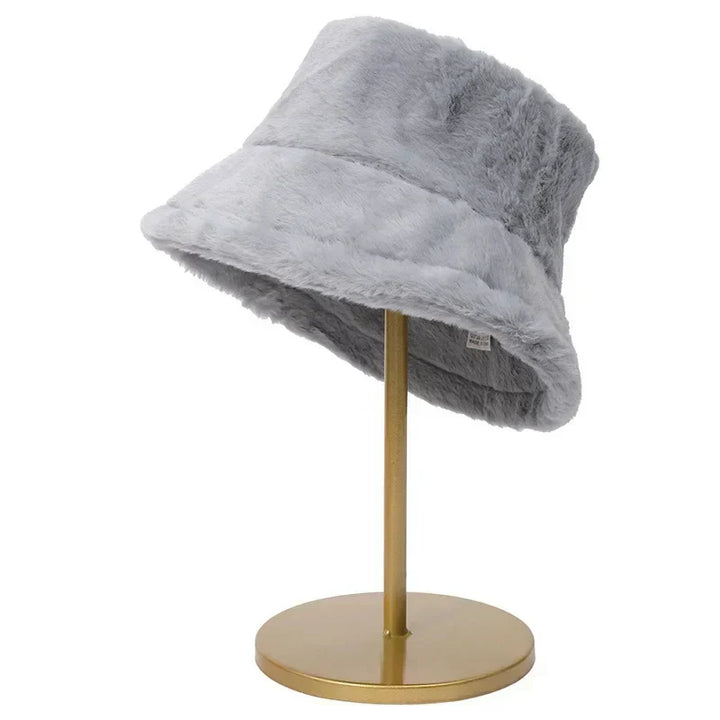 Versatile women's faux fur bucket hat, cozy for autumn, warm for winter.