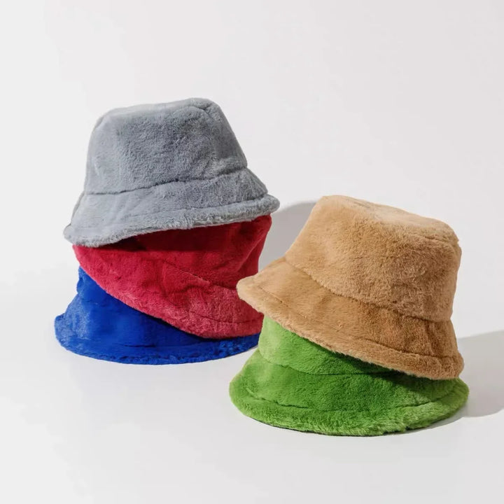 Luxurious feel faux fur bucket hat for women, warm headwear for cold seasons.