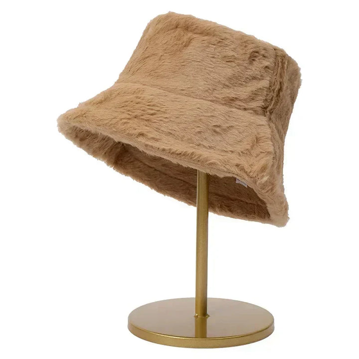 Chic faux fur bucket hat for women, a warm autumn & winter fashion accessory.