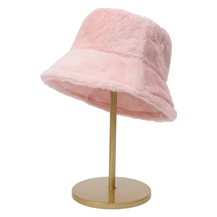 Plush faux rabbit fur bucket hat for women, ideal for cold weather fashion.