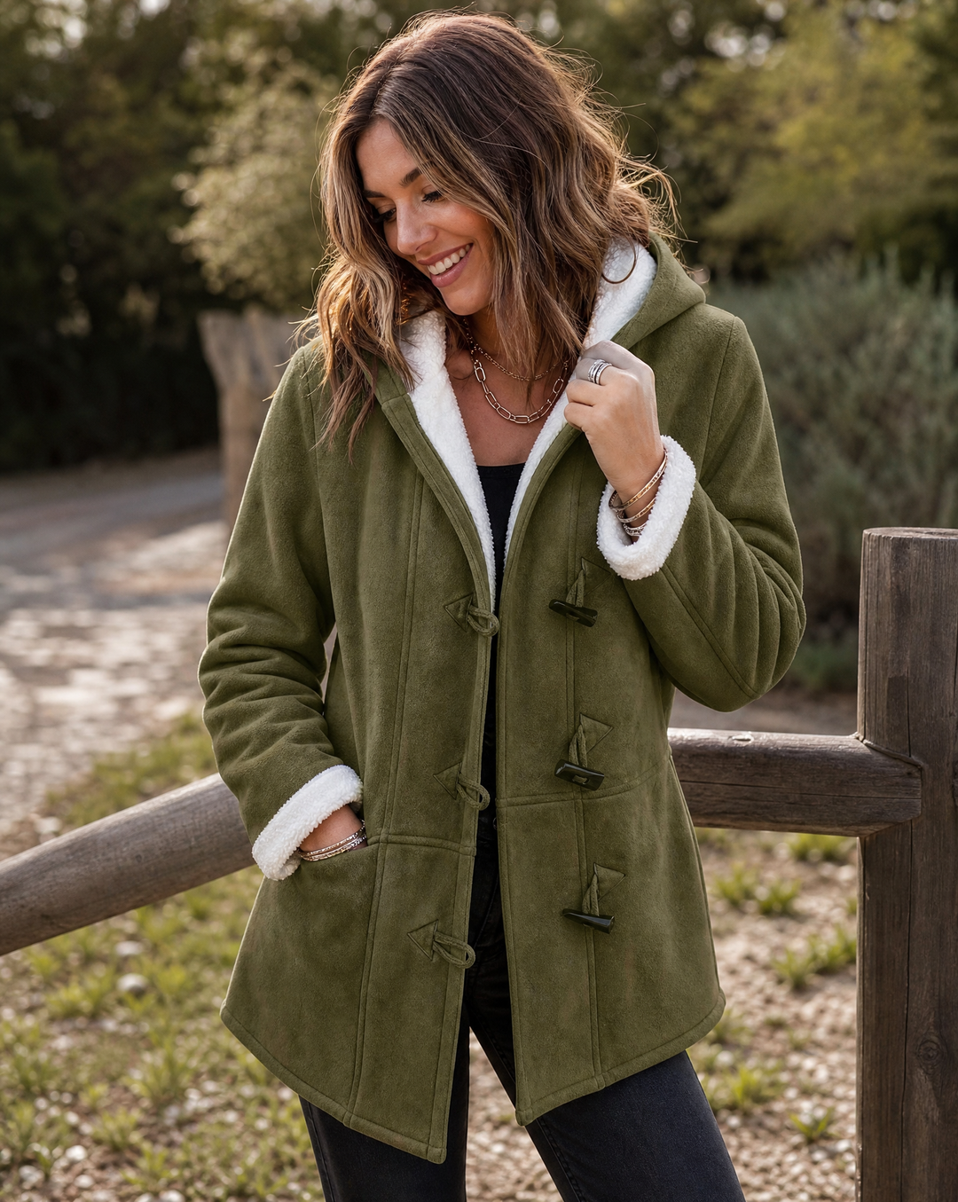 Women's warm hooded winter coat, a cozy relaxed fit for cold weather fashion and everyday comfort.