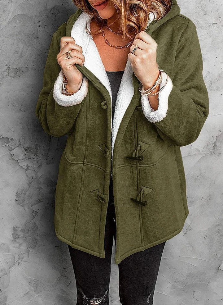 Insulated women's warm hooded winter coat, crafted for superior warmth and comfort in the cold.