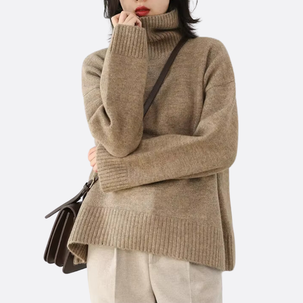 Warm & cozy women's oversized turtleneck sweater, a relaxed fit knitwear piece for stylish winter outfits.