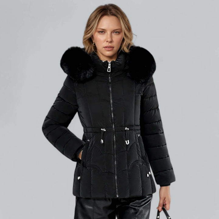 Women's warm padded parka coat with stylish faux fur hood for winter.