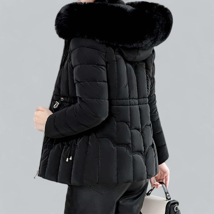 Cozy women's padded winter parka jacket with faux fur hood for ultimate warmth in cold weather.