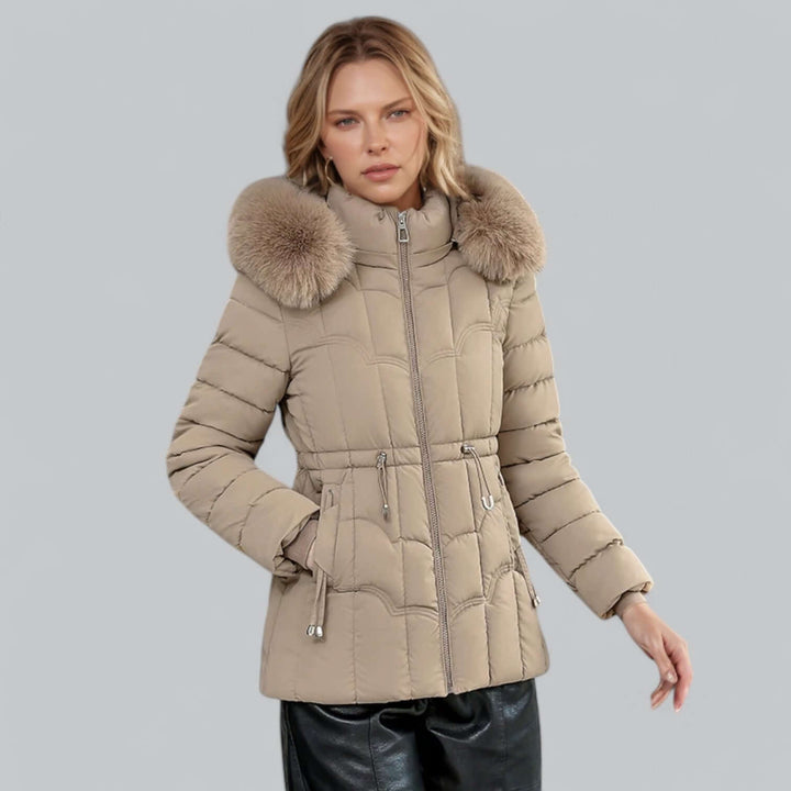 Stylish women's water-resistant parka jacket, padded, with adjustable fit and faux fur hood.