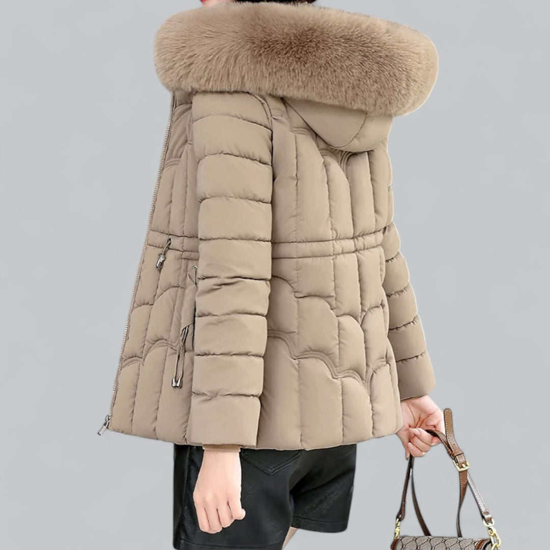 Ladies' warm padded winter parka jacket featuring a cozy faux fur hood and durable outerwear.