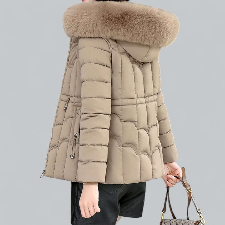 Ladies' warm padded winter parka jacket featuring a cozy faux fur hood and durable outerwear.