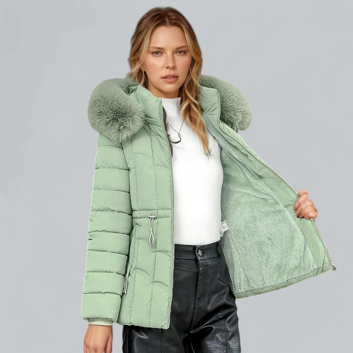 Women's ultimate cold-weather padded parka coat with a stylish faux fur hood for warmth.