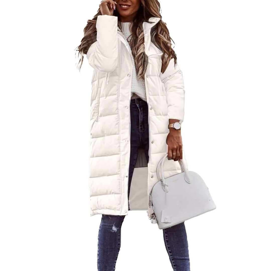 Modern women's stylish padded winter coat with hood, providing cozy warmth for contemporary winter looks.