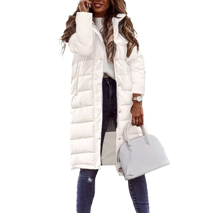 Modern women's stylish padded winter coat with hood, providing cozy warmth for contemporary winter looks.