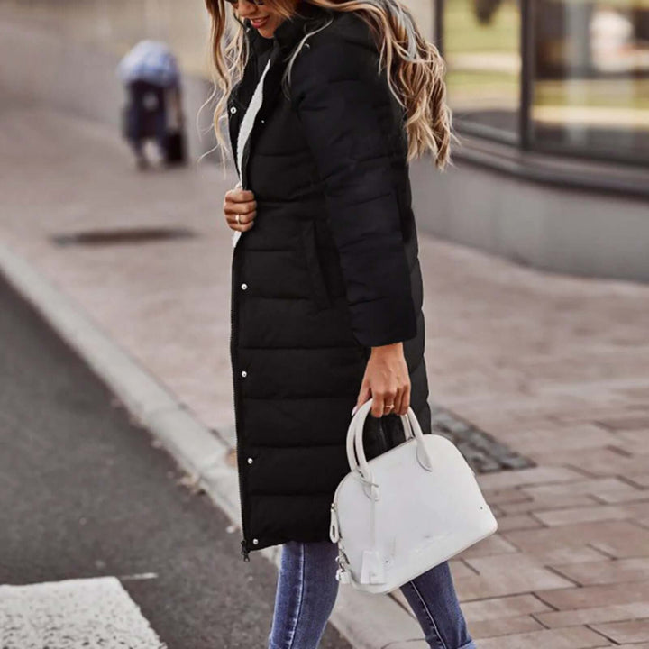 Cozy women's padded winter jacket with a hood for ultimate warmth and stylish cold weather outerwear.