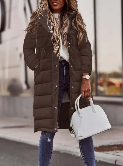 Soft, cozy women's padded winter coat with a hood, designed for maximum warmth and comfort.