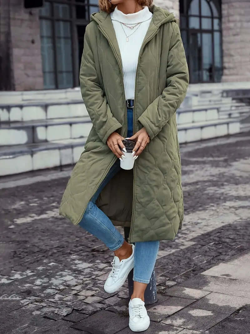 Women's long sleeve quilted down coat with hood, a fashionable and warm winter outerwear insulated jacket.
