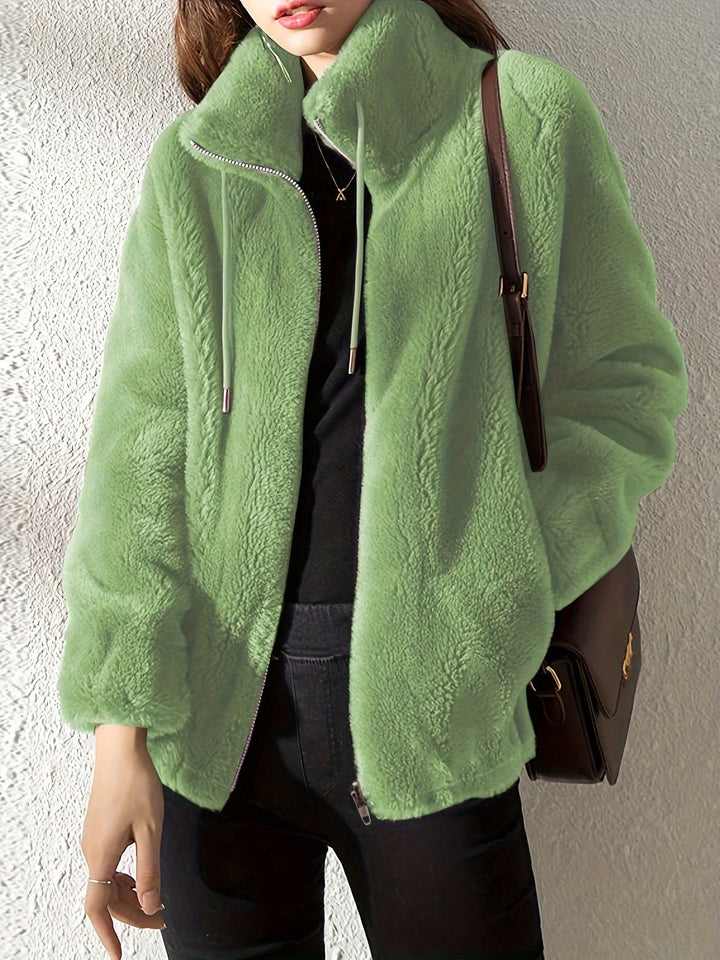 Women's warm teddy coat, Isla, with cozy texture, front zipper, and adjustable drawstring for stylish winter comfort.