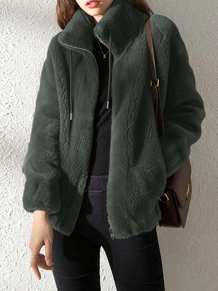 Cozy women's Isla teddy coat, warm winter jacket with a full zipper, soft fabric, and drawstring waist.