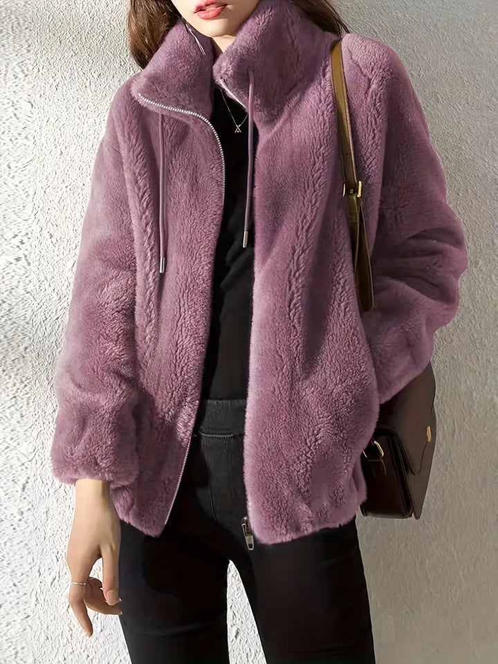 Women's Isla teddy winter coat, super warm with a full zip front, soft texture, and trendy drawstring detail.