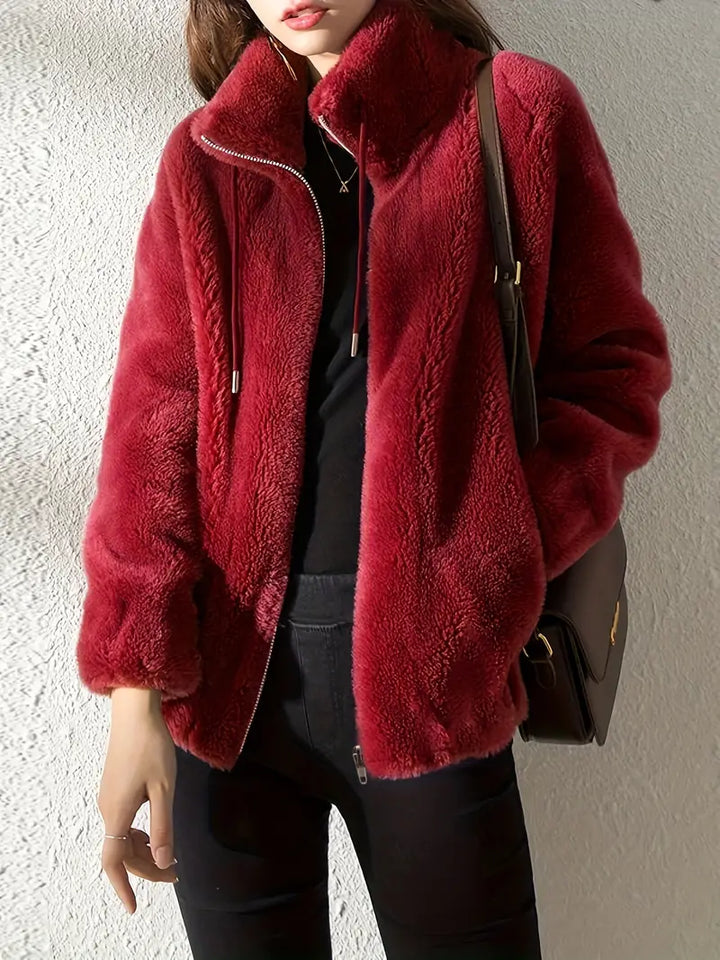 Versatile women's Isla teddy coat, warm fall/winter jacket with functional zipper and adjustable drawstring.