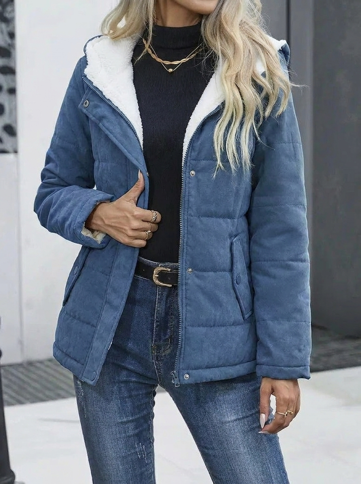 Women's warm zip-up hooded winter jacket for cold weather protection & style.