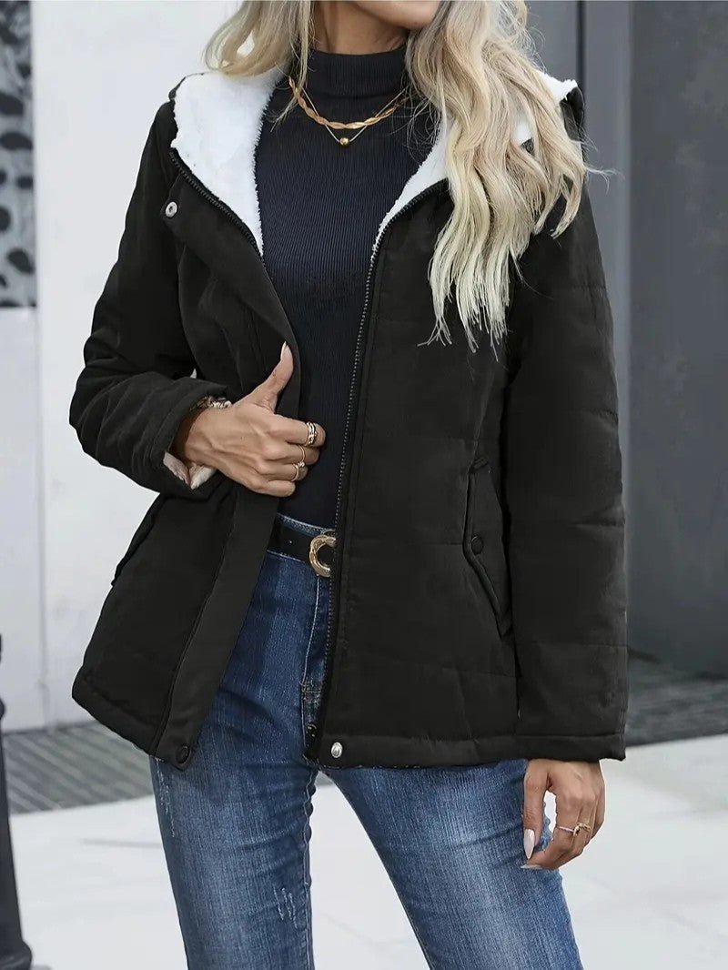 Insulated women's hooded winter coat with zip closure, ideal for freezing temps.