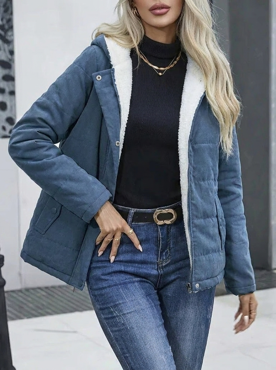 Cozy women's insulated winter jacket with a hood, perfect for chilly days.