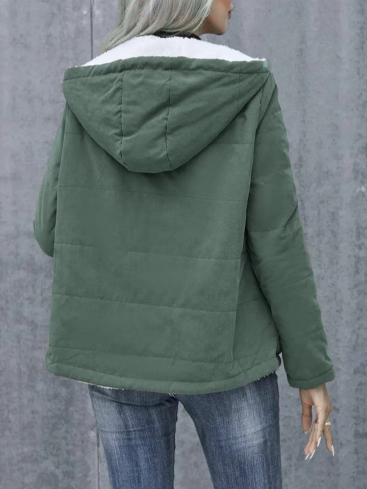 Women's practical hooded winter coat, zip-up, offering warmth and a modern look.